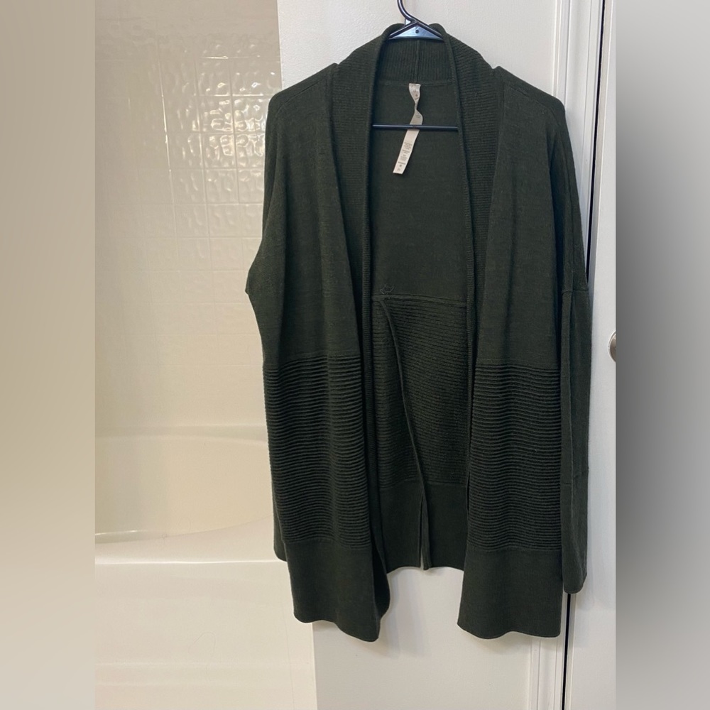 Lululemon olive green cardigan. Lots of detail. Women’s size 12.